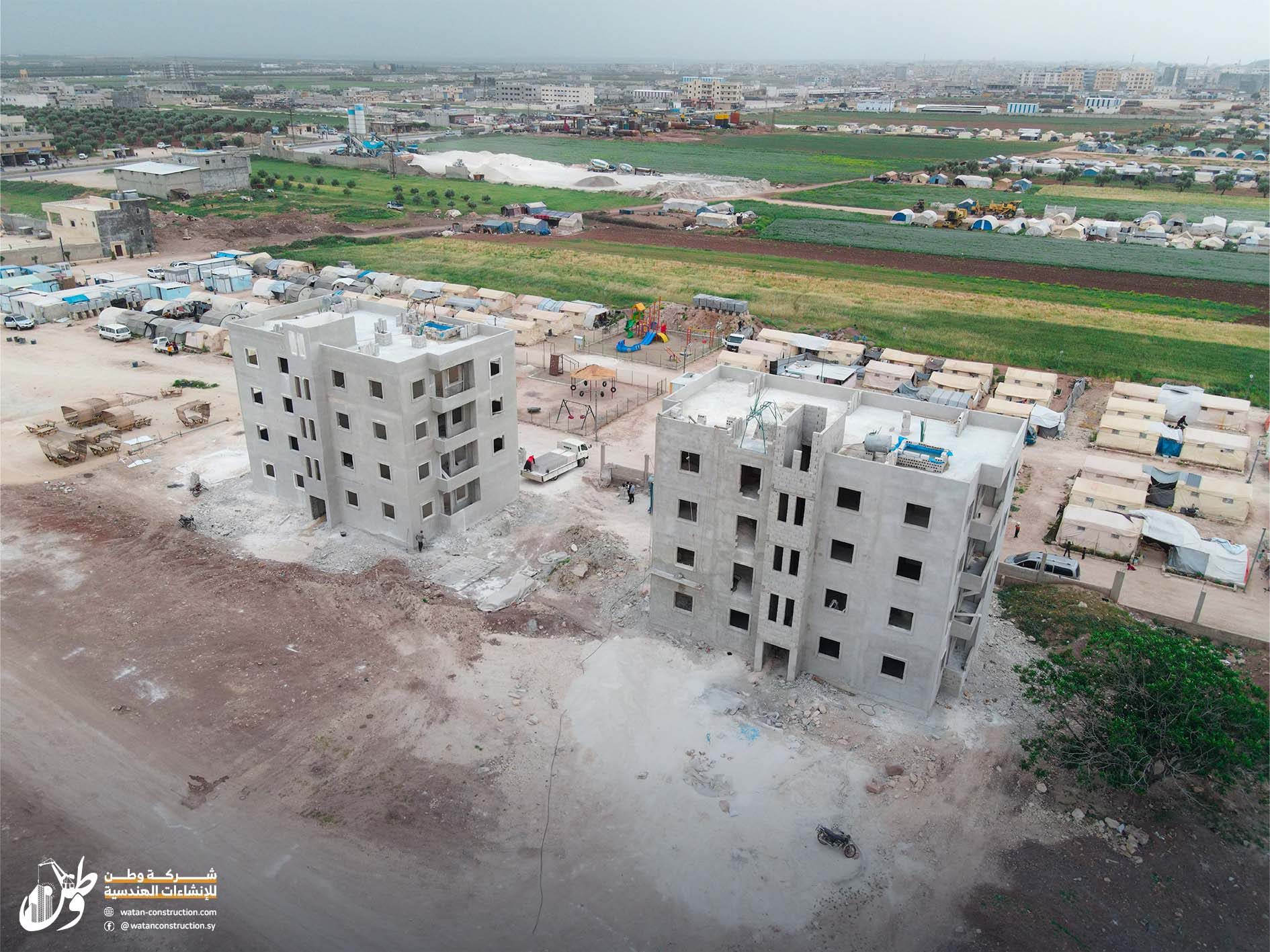 Aerial photos of the project to construct two buildings in Azaz, Zariqa works, and prepare the floor1